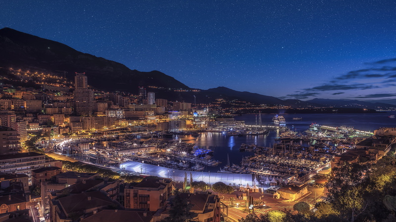starry sky, panorama, outdoors, building exterior, monaco, illuminated, high angle view, astronomy, mountain, water, space, star - space, dusk, city, nature