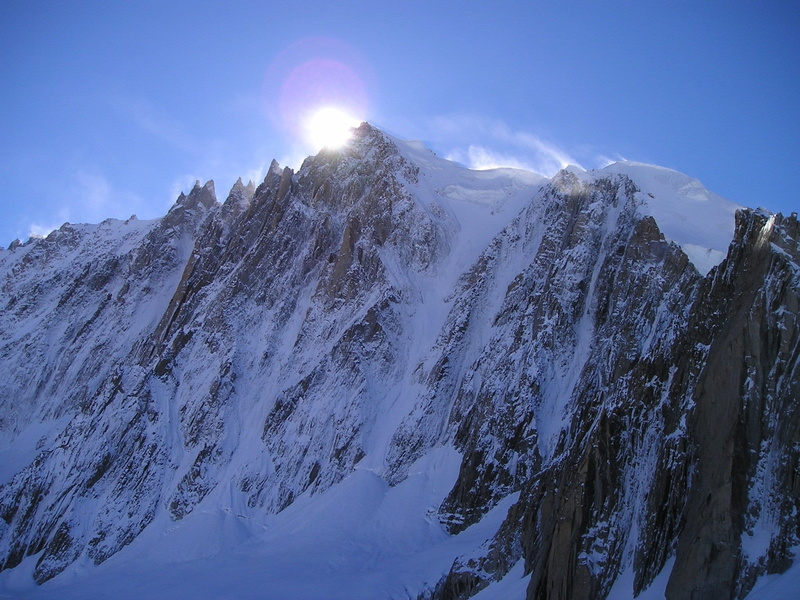 alpine, sunlight, no people, sky, coniferous tree, extreme terrain, cold temperature, non-urban scene, mont blanc du tacul, landscape, outdoors, environment