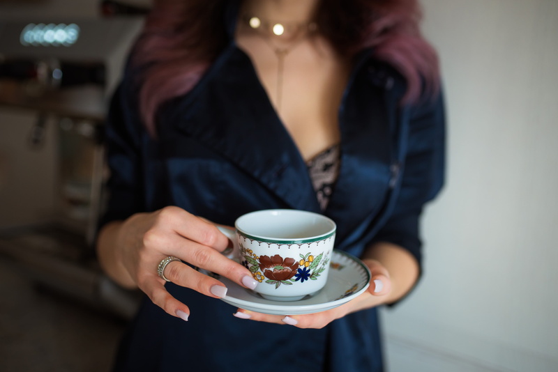 front view, refreshment, adult, coffee cup, tea, one person, coffee - drink, coffee break, teacup, midsection, hand, person, women, drink, indoors, holding