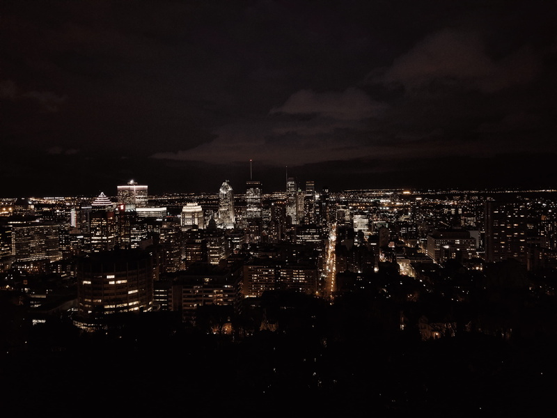 building exterior, citylights, crowded, tower, crowd, view, light, aerial, residential district, horizon, city view, office building exterior, illuminated