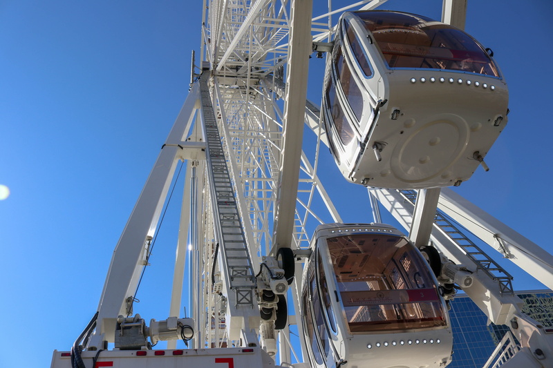 wheel, transportation, low angle view, technology, fair, blue, water, amusement, attraction, ferris, nautical vessel, clear sky, harbor, no people, architecture