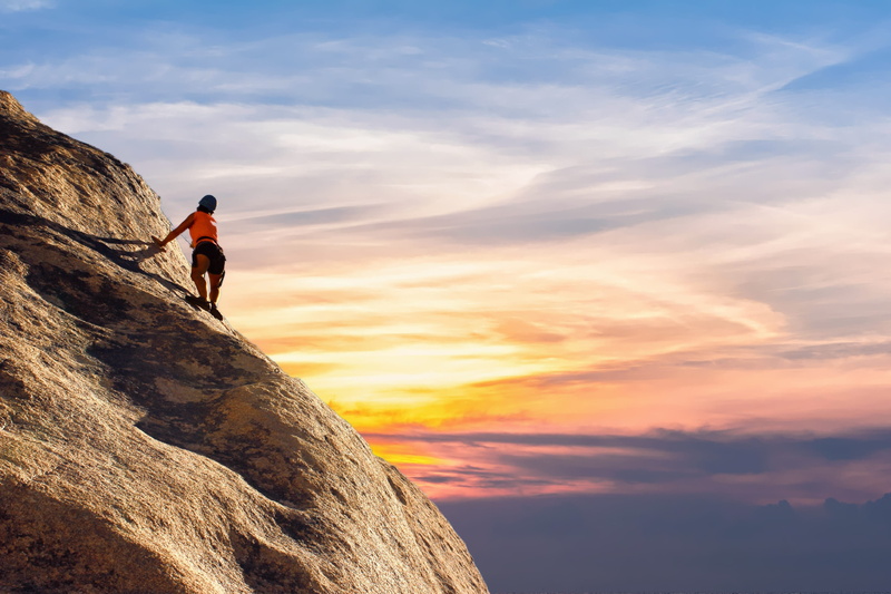 outdoors, sport, sky, rock - object, nature, courage, challenge, rock, mountaineer, adventure, beauty in nature, extreme sports, person, rock climbing