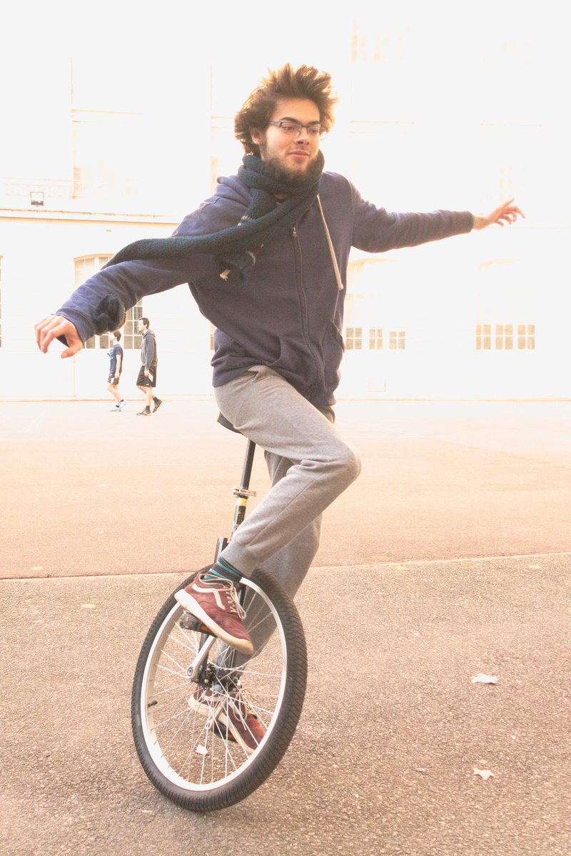 full length, real people, cycle, city, outdoors, balance, ride, lifestyles, unicycle, equilibrium, young adult, human arm, young men, 2K, smiling, portrait
