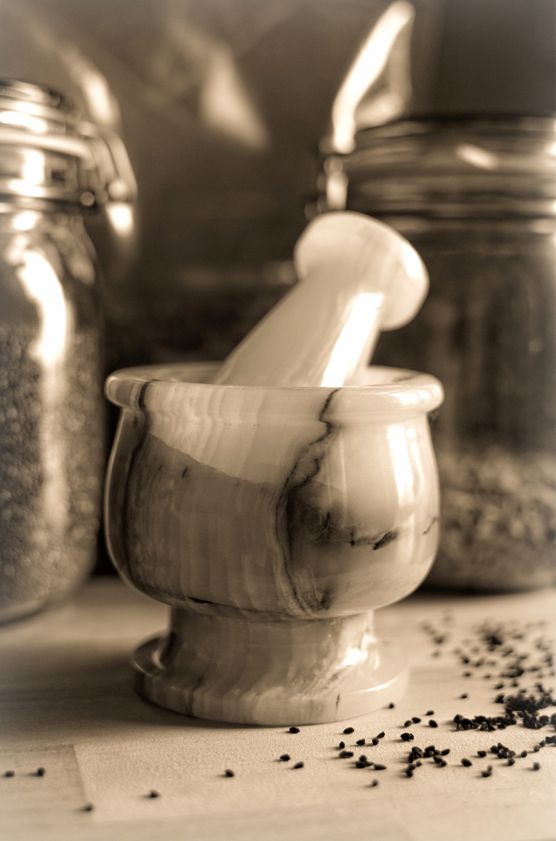 food and drink, spices, lighting equipment, mortar, healthcare and medicine, herbalism, still life, table, selective focus, indoors, wood - material, transparent