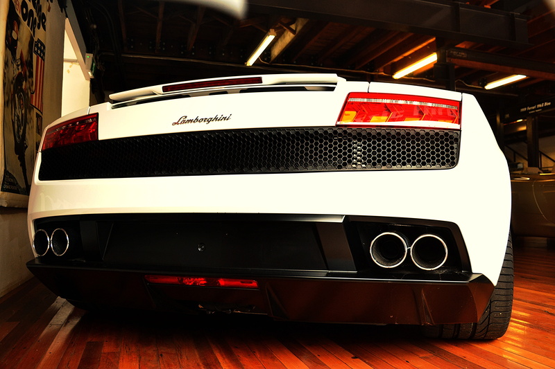 indoors, Lamborghini Gallardo, motor vehicle, transportation, Lamborghini, land vehicle, no people, retro styled, car, table, western script, the past