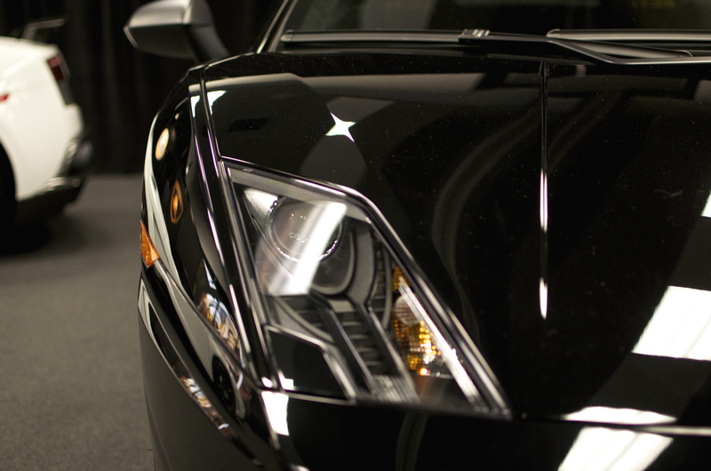 vehicle light, car, focus on foreground, night, mode of transportation, silver colored, land vehicle, headlight, transportation, consumerism, chrome, Lamborghini Gallardo