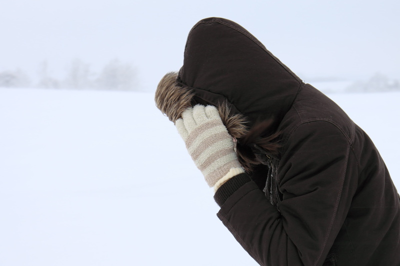 zipped, outdoors, hood - clothing, girl, glove, one person, snowfall, storm, gloves, walking, lifestyles, pedestrian, day, women, waist up, people, cold temperature