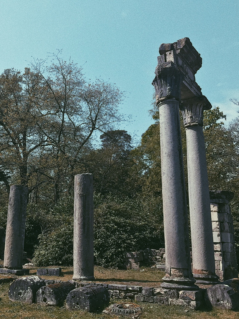ancient civilization, no people, stone, pillar, old ruin, vehicle, steeple, ruined, plant, sky, ancient, 2K, tower, nature, building, slate, airplane