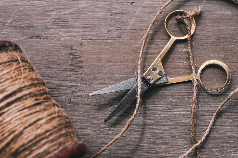 rau, textile, thread, man made object, retro, still life, man made, craft, metal, decorative, high angle view, wood, indoors, coil, surface, table, hemp cord