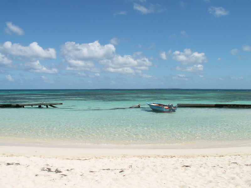 blue, day, beach, sand, mode of transportation, island, nautical Vessel, tranquil scene, shore, tranquility, daytime, sky, side, coastline, turquoise colored