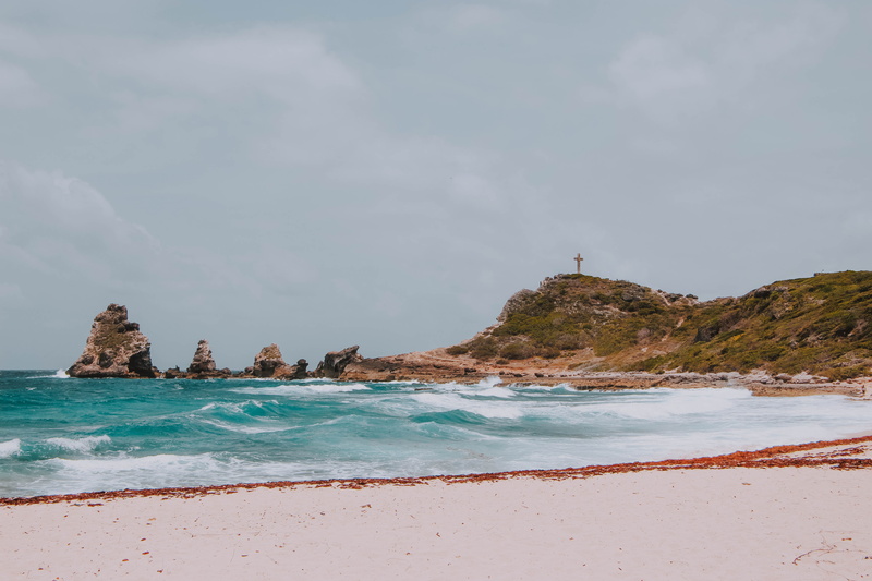 day, shoreline, coast, tropical, scenics - nature, promontory, outdoors, architecture, guadeloupe, exotic, no people, rock formation, tranquility, water