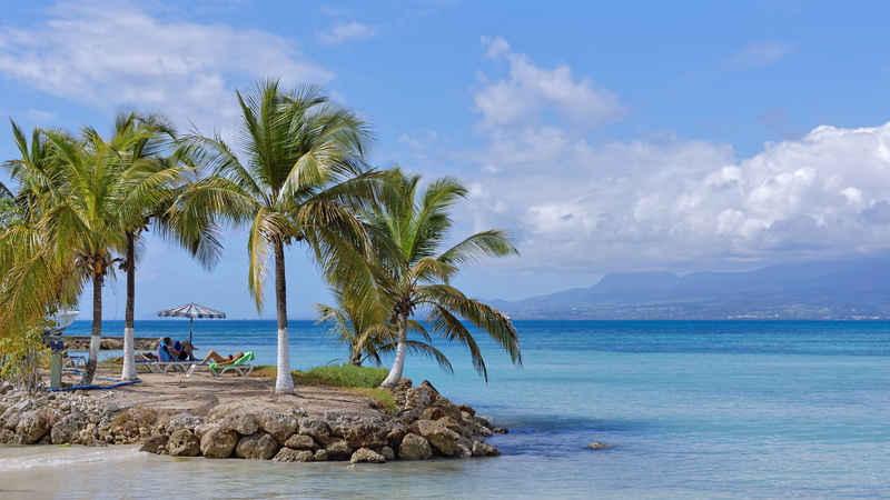 scenics - nature, beach, exotic, coconut palm tree, day, blue, tourism, water, horizon, tropical climate, plant, cloud, sky, island, bay, sun, land, outdoors