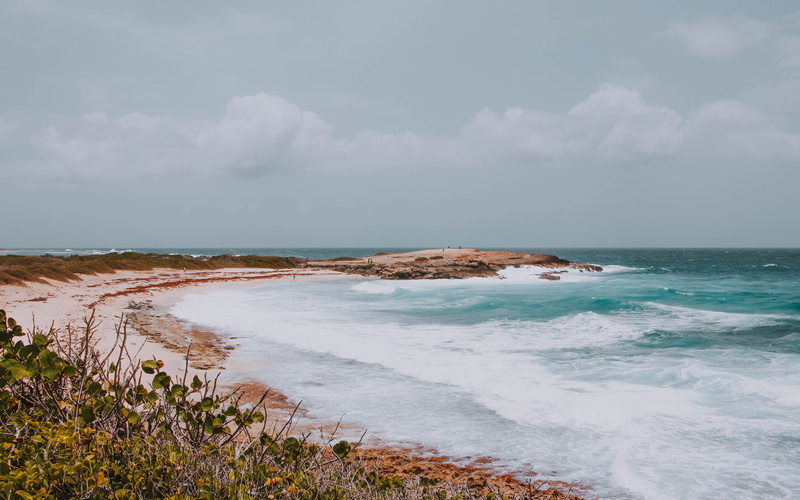 ocean, building, island, sport, aquatic sport, sky, promontory, power in nature, tower, motion, horizon over water, 5K, sea, outdoors, grass, surfing