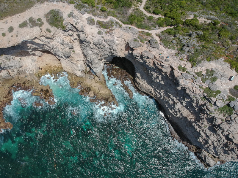 beauty in nature, natural arch, eroded, tranquility, no people, sea, blue, rock formation, rock, seascape, island, pointe des châteaux, high angle view