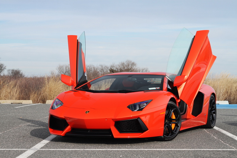 orange, stationary, coupe, land Vehicle, motor Vehicle, day, power, new, wheel, communication, modern, sports Race, outdoors, city, sports Car, Lamborghini