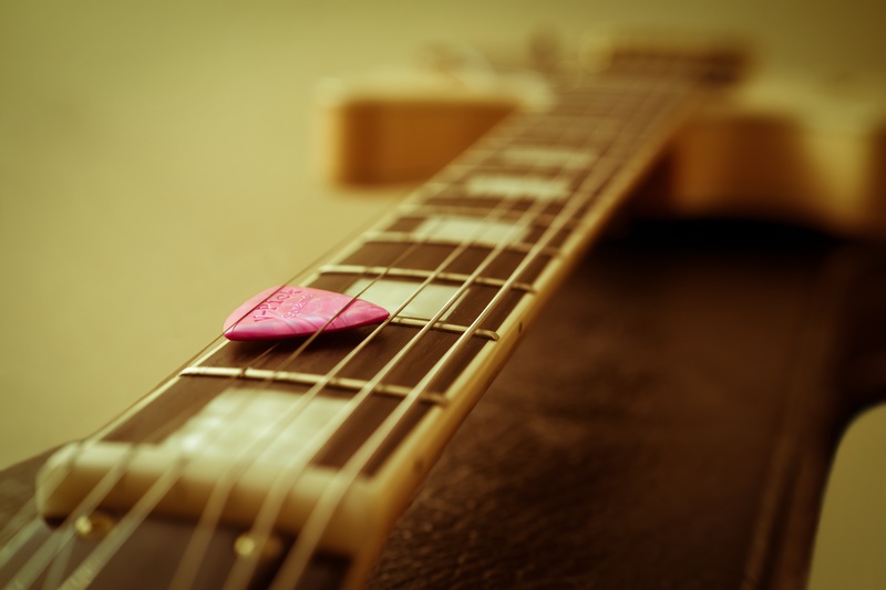 chord, photography, brown, saddle, indoors, musical equipment, arts culture and entertainment, single object, fretboard, guitar, string, musical Instrument