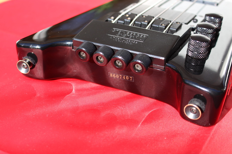 e bass, equipment, electrical equipment, strings, indoors, Bass, Steinberger, stringed instrument, rock music, plastic, text, electricity, modern, car