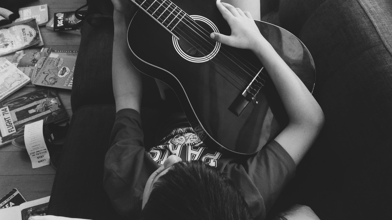 music, sofa, real people, acoustic guitar, musical equipment, men, arts culture and entertainment, entertainment, head, photography, acoustic, man, holding