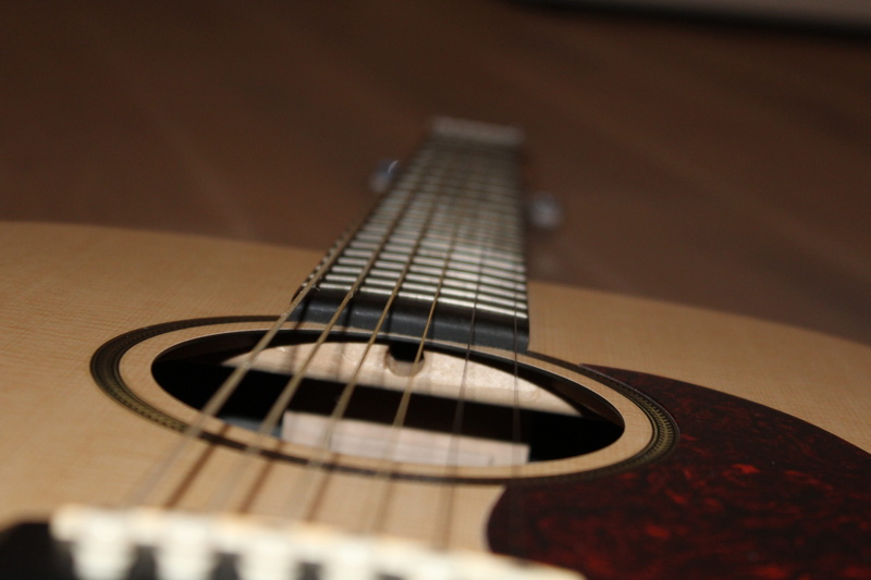 close-up, music, finger exercise, close up, wood - material, black, single object, rock music, string instrument, no people, colored background, 5K, focus on foreground