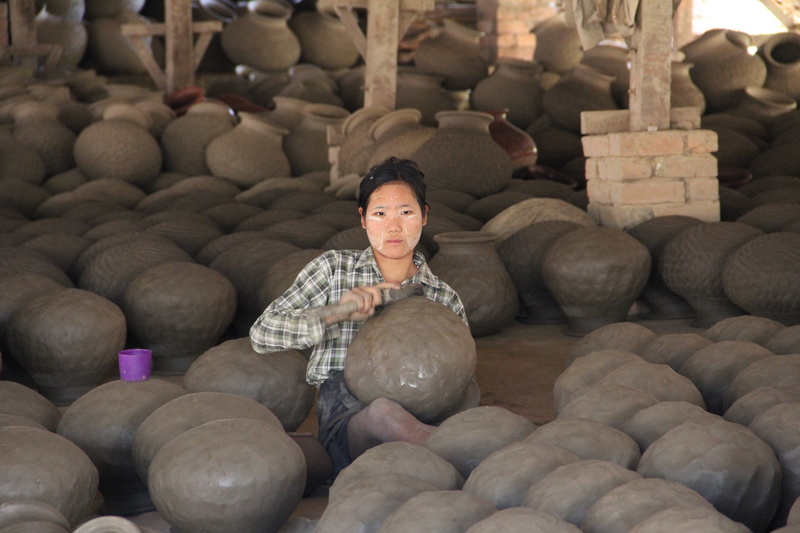 stack, relaxation, potters wheel, indoors, confidence, one person, pottery, 5K, business, sound, mid adult, abundance, pottery workshop, sitting, front view