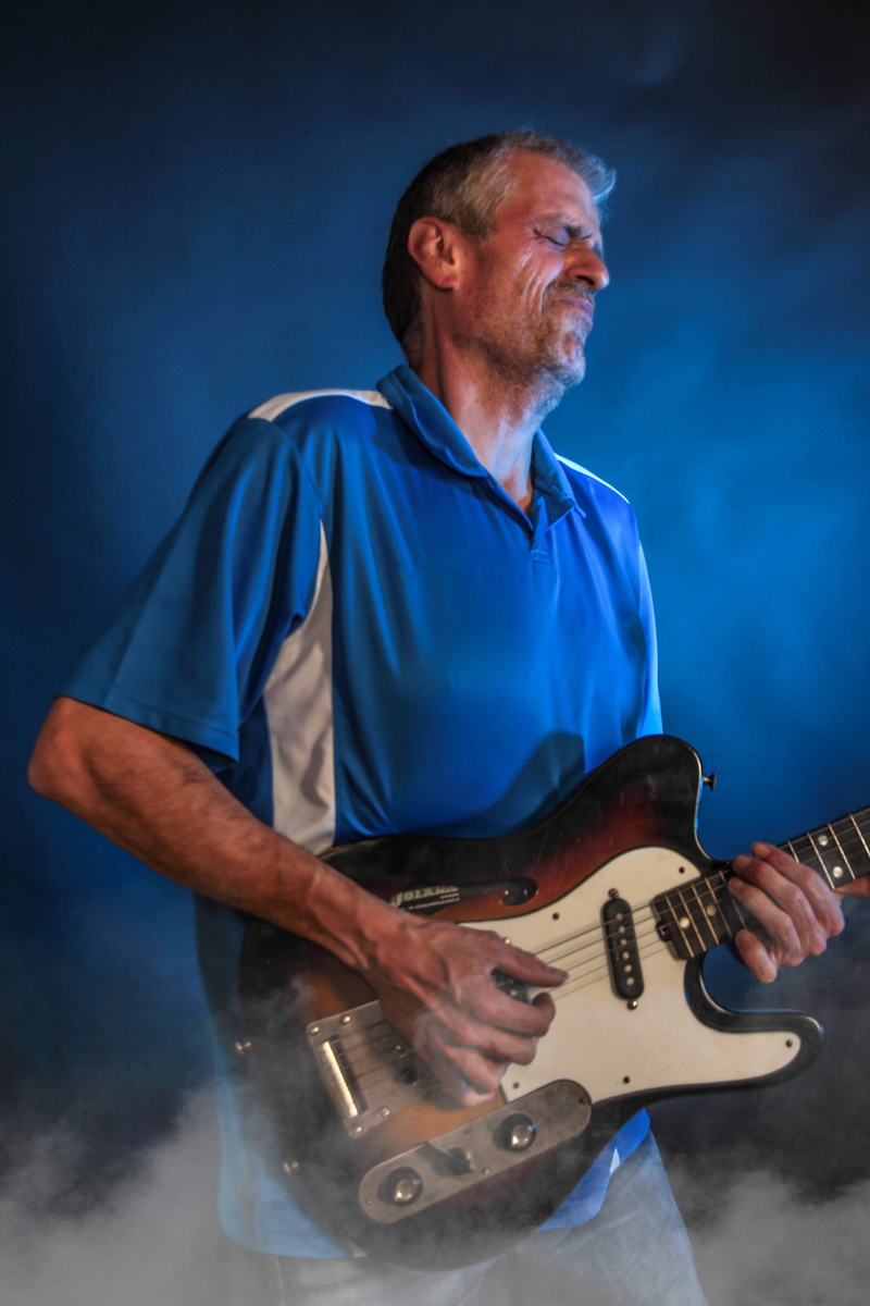 plucking an instrument, playing, sound, skill, musical equipment, performance, waist up, electric Guitar, 5K, artist, mature men, mature adult, men, performer