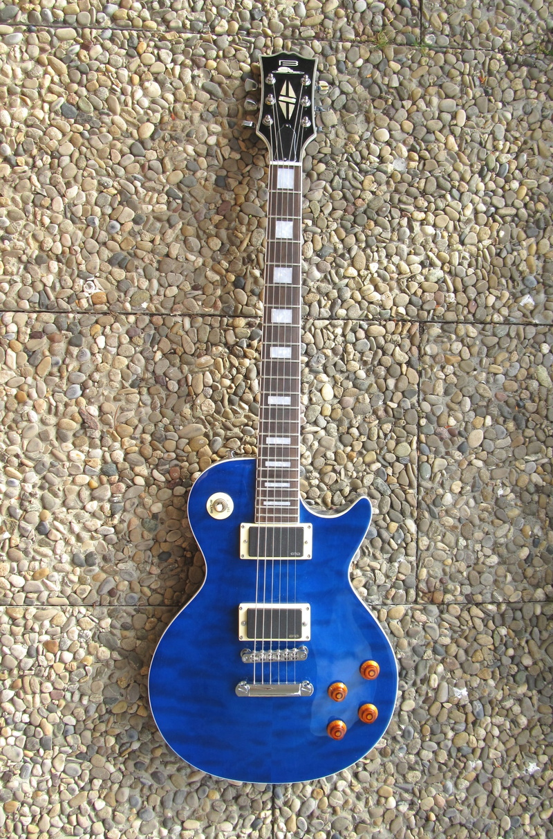 electric guitar, musical equipment, close-up, high angle view, blue, no people, music, 2K, textured, entertainment, indoors, musical instrument, bakery