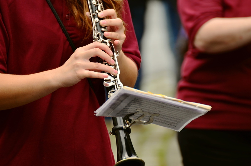 offspring, day, midsection, uniform, holder, instrument, black, close-up, holding, hand, musician, artist, one person, performance, musical, music, silver