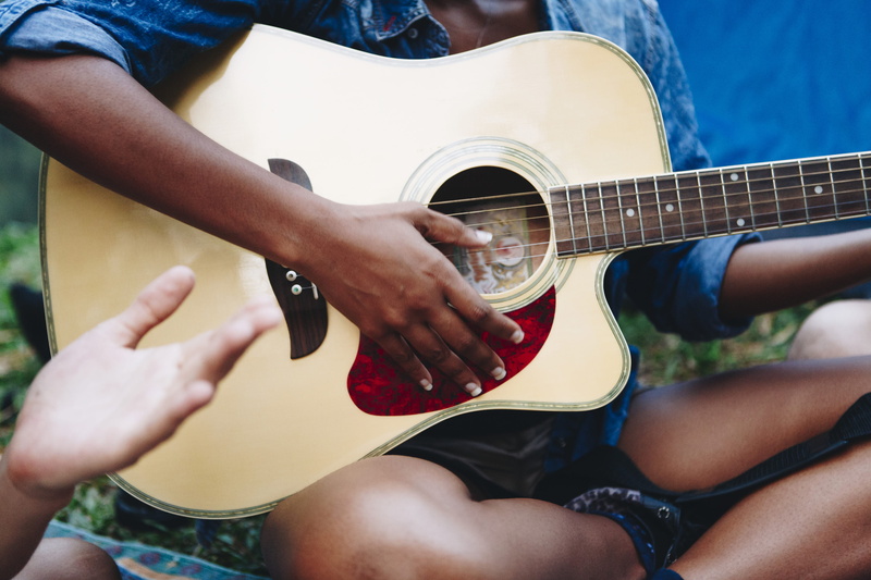leisure Activity, caucasian Ethnicity, guitarist, cross legged, women, country and Western Music, young Adult, females, hand, lifestyles, togetherness