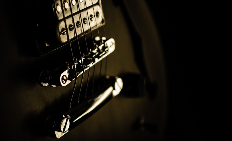 string instrument, bridge, black background, amplifier, no people, electric, reflection, studio shot, selective focus, musical equipment, dark, rock music