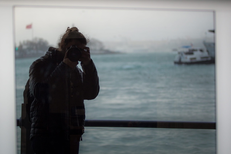 digital camera, lifestyles, real people, apparel, focus on foreground, boardwalk, 2K, waist up, leisure activity, jacket, water, human, photographer, photographing