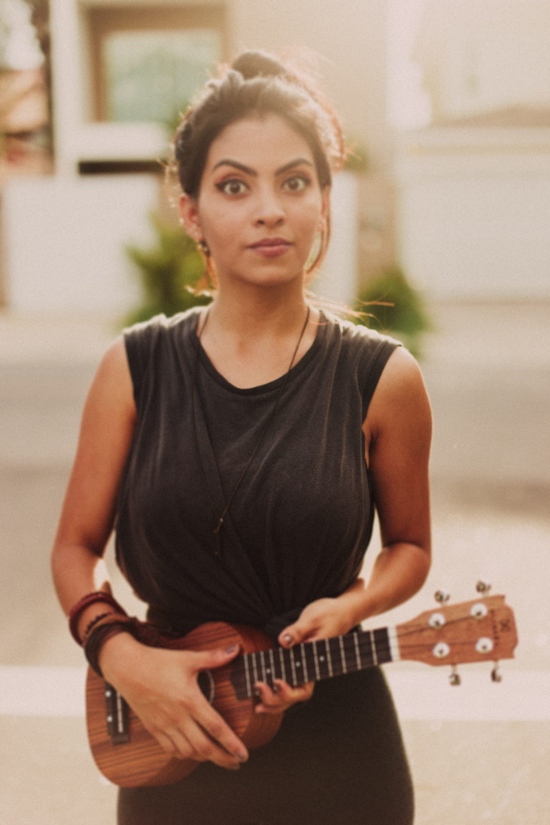 performance, crazy, relaxation, one person, leisure, woman, portrait, acoustic guitar, fashion, holding, skill, musical instrument, playing, recreation