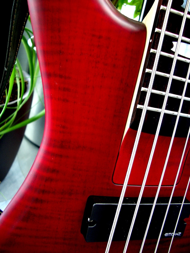 red, musical equipment, no people, close-up, day, focus on foreground, metal, guitar, strings, musical instrument, arts culture and entertainment, indoors