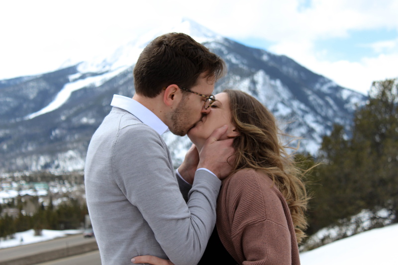 hair, warm clothing, togetherness, trees, positive emotion, adult, mountains, nature, hug, person, snow, kiss, viewpoint, human, leisure activity, emotion
