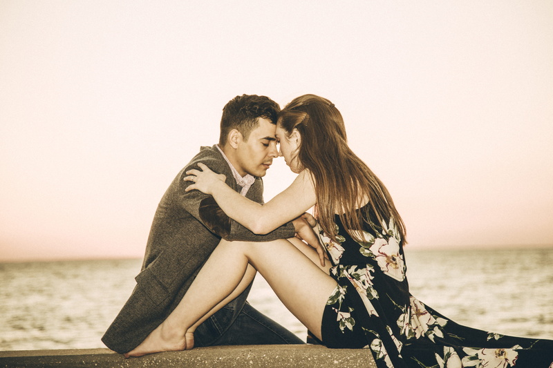 dating, sitting, hair, beach, heterosexual couple, young women, women, apparel, leisure activity, beside, shoe, horizon over water, flooring, pants, female