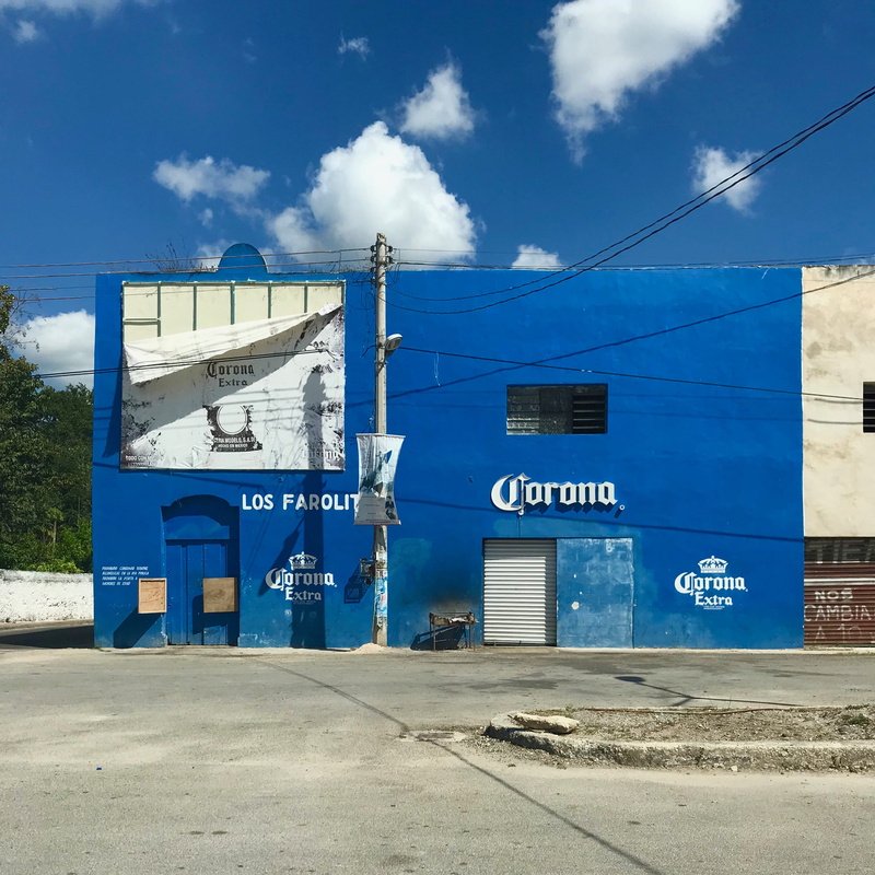 sunlight, day, sky, transportation, built structure, beer, text, cerveza, lettering, 2K, no people, outdoors, hispanic, road, typography, street, corona