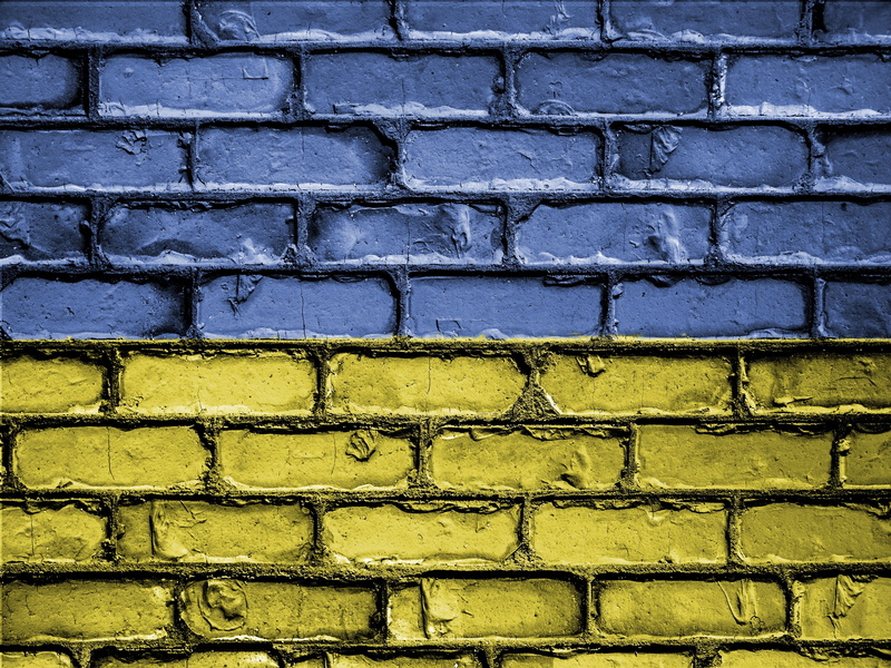 outdoors, built structure, nature, symbol, close-up, textured, brick wall, yellow, patriotism, wall - building feature, ukraine, backgrounds, building exterior