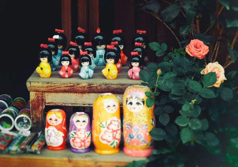 belief, in a row, close-up, figurine, toy, bottle, 2K, sweets, male likeness, day, no people, multi colored, sculpture, beverage, flowers, representation