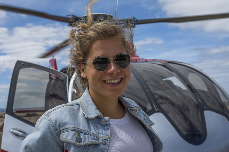front, car, 5K, transportation, adult, emotion, smile, empowerwomen, travel, front view, hairstyle, person, helicopter, day, vehicle, top gun, empower