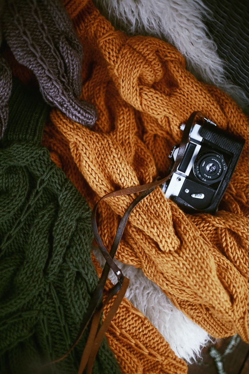 white, craft, black, indoors, sweater, warm clothing, no people, photography themes, technology, creativity, knitwear, textile, material, fabric, close-up