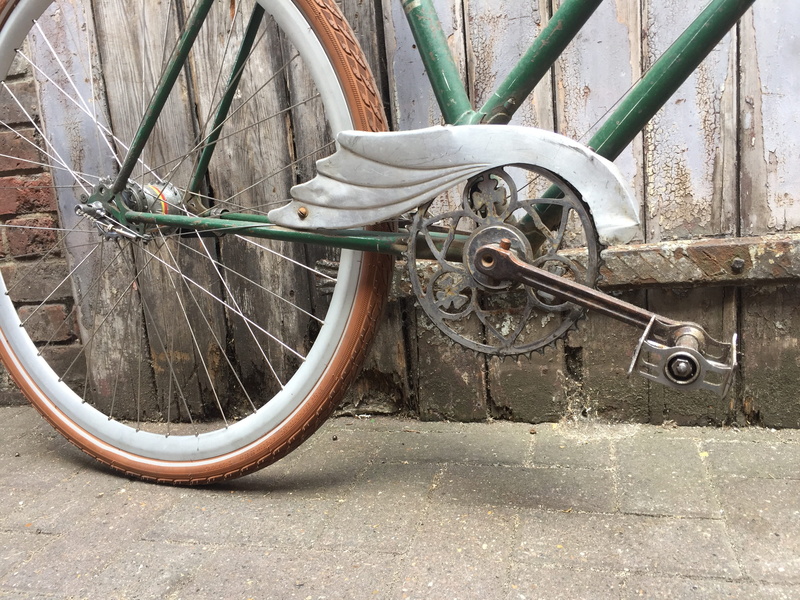 day, mode of transportation, axle, land vehicle, suspension, tarmac, deterioration, motor, obsolete, bicycle, damaged, parking, vespa, asphalt, no people