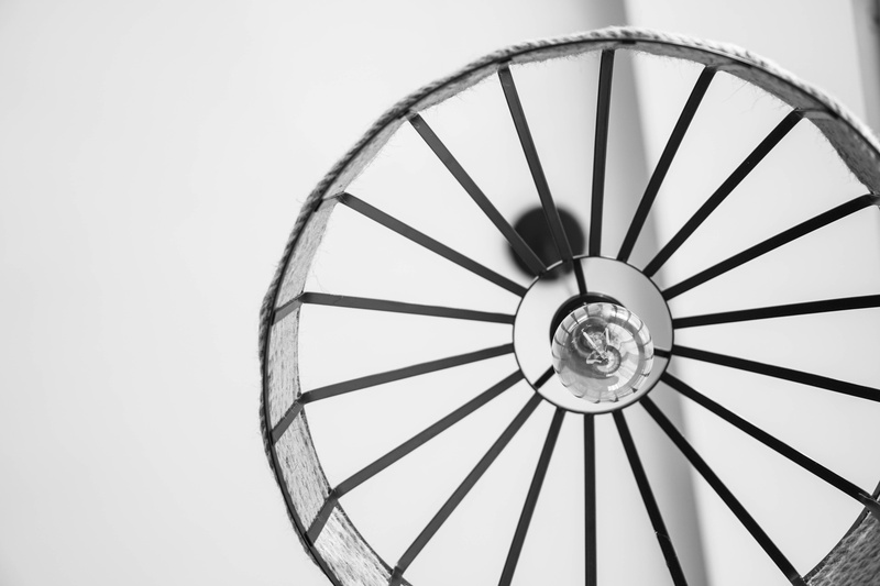 circle, white background, alloy wheel, pattern, stand, ceiling, day, single object, no people, close-up, bowl, gear, indoors, shop, banister, wheel, metal