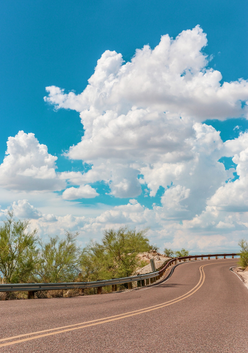 empty road, cloud - sky, nature, landscape, direction, plant, blue, day, road, city, peace, tree, tranquility, beauty in nature, crash barrier, outdoors