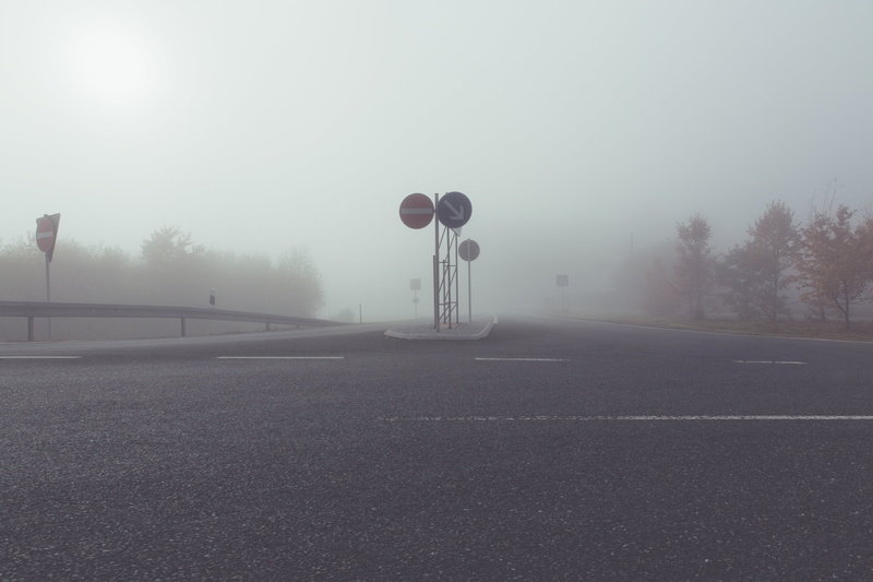 direction, transit, lane, fog, crash barriers, road sign, ground fog, road network, infrastructure, driveway, sign, mobility, distant, automotive, no people