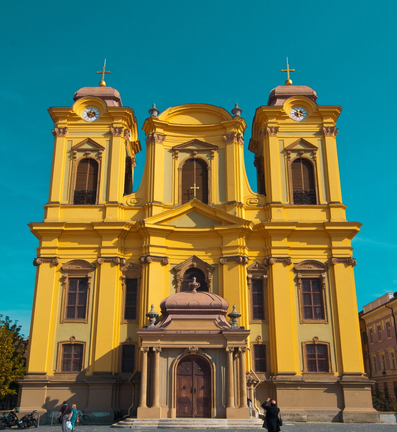 tourist, yellow, old, travel destinations, no people, romania, blue sky, sculpture, city, timisoara, facade, old town, built structure, traditional, architectural column
