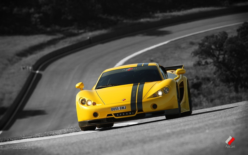yellow, asphalt, motor racing track, ascari a10, sports race, sign, transportation, road, car, street, mode of transportation, travel, city, journey, day