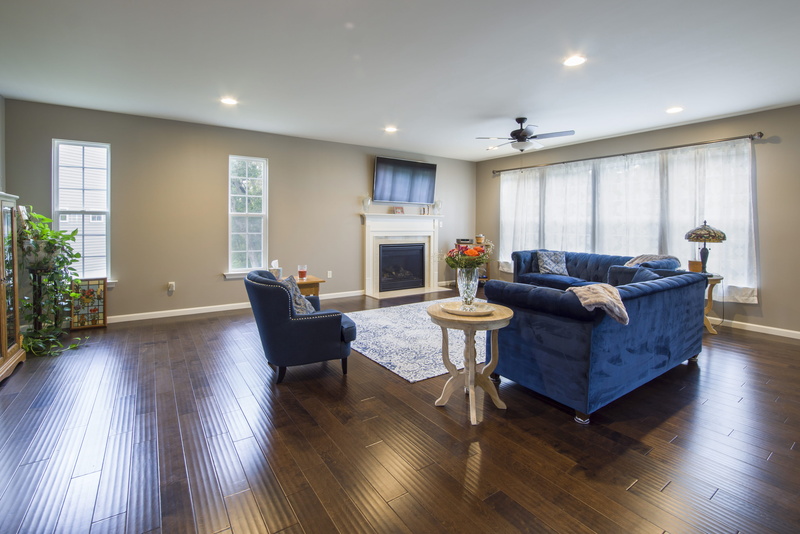 flooring, spacious, living space, hardwood floor, room, couch, wood planks, home interior, domestic room, chair, sofa, 5K, home, luxury, living room, furniture