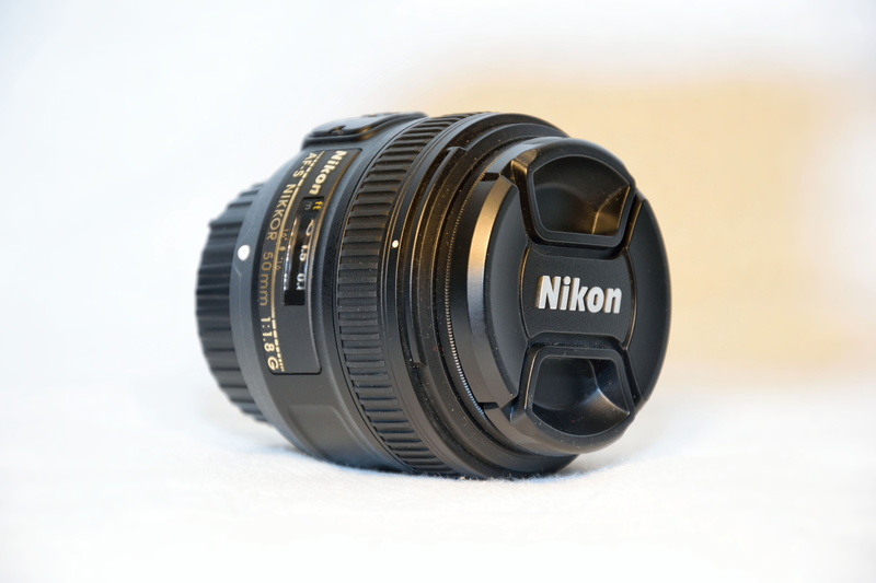 lens, photography themes, glass, no people, camera - photographic equipment, modern, nikon, indoors, equipment, white background, light, portrait, photo