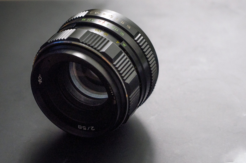 photography themes, geometric shape, lens - eye, glass, film, black color, technology, circle, Lens, Mm, single object, indoors, aperture, 50 mm, still life