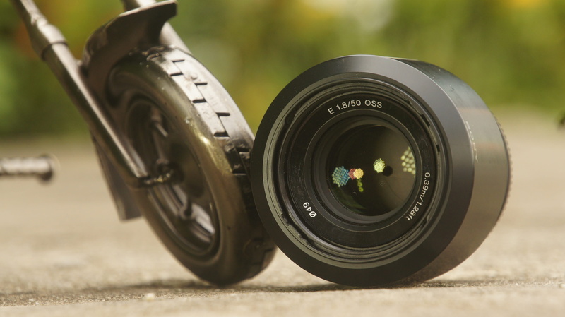 toys, day, wheel, garden, black color, 4K, selective focus, shape, outdoors, photographic equipment, geometric shape, tire, lens - optical instrument