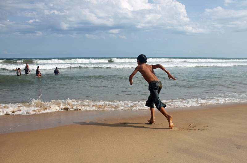 leisure activity, seashore, shirtless, daytime, motion, men, young people having fun, happy, sea, child, summer fun, people, childhood, boy, beach, beach fun